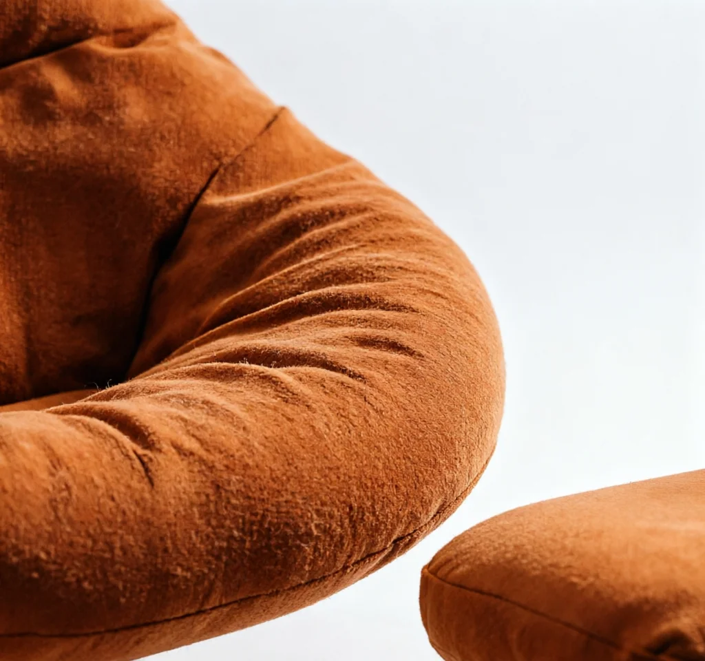 Aura Sculptural Swivel & Ottoman — detail view